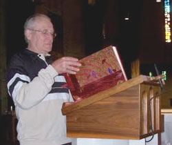Lector at the ambo in St. Charles Borromeo Church
